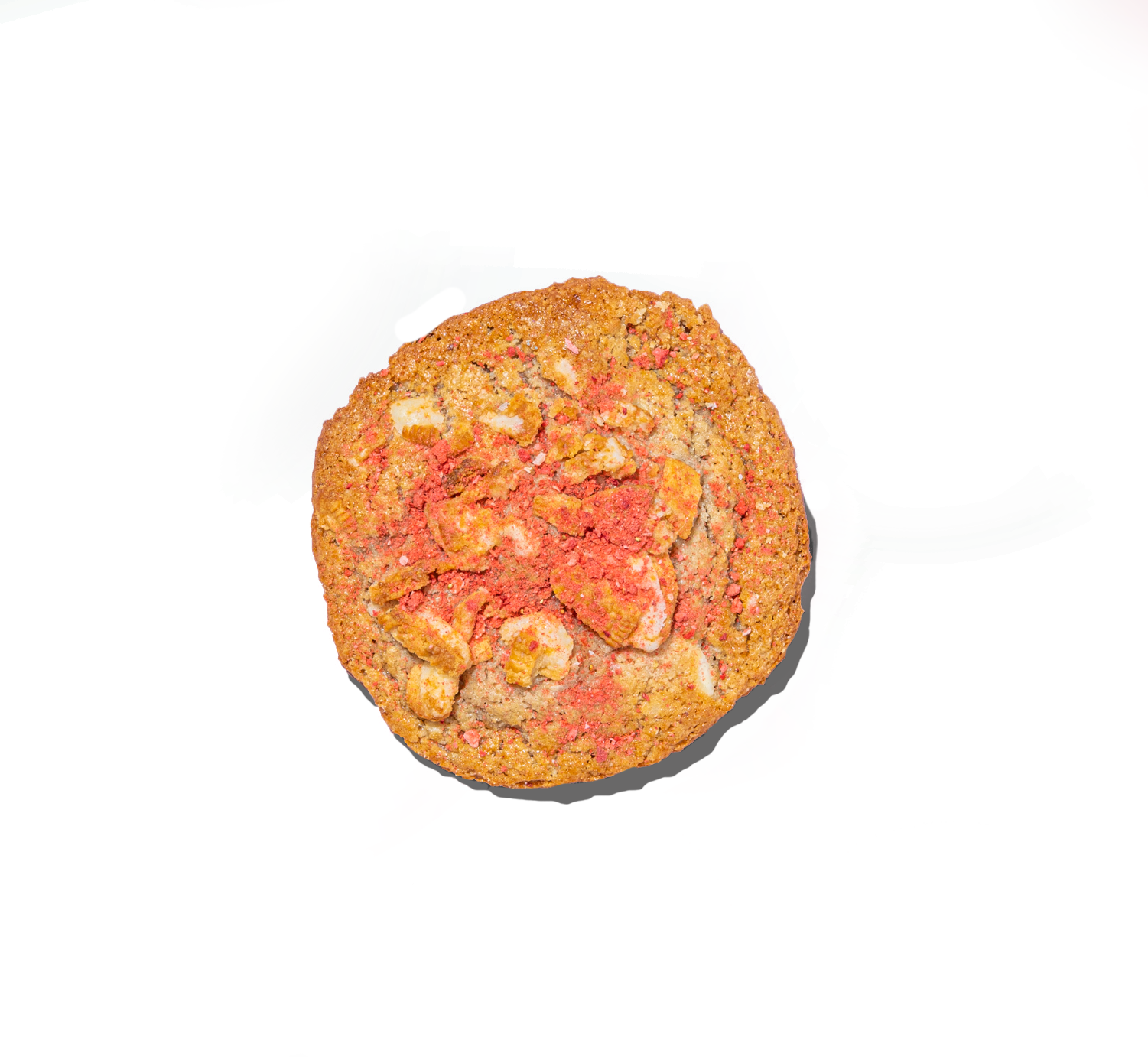 Cookie with visible pink and orange colors on a white background