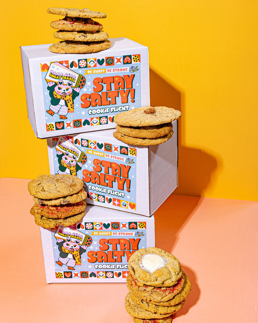 Cookies with a 'Stay Salty!' themed box on a yellow and orange gradient background