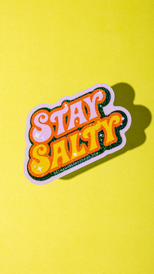 Sticker with 'Stay Salty' text on a yellow background