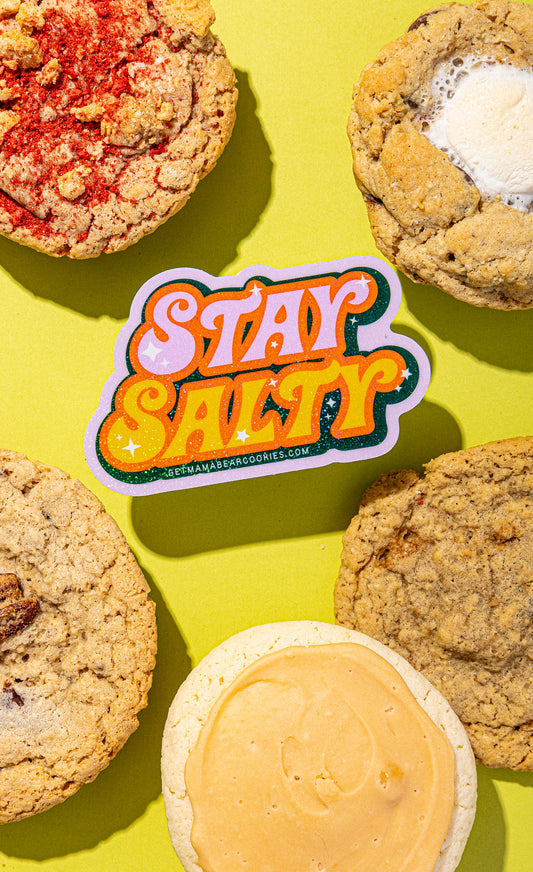 Cookies with a 'Stay Salty' sticker on a yellow background